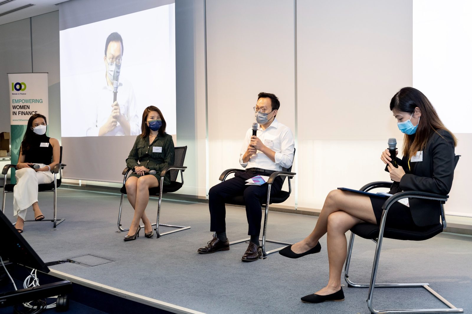 Horris Tse speaking on a Women in Finance panel